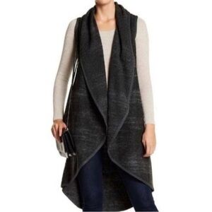 Sleeveless wool blend vest cardigan sweater. Wool and cotton blend. Medium